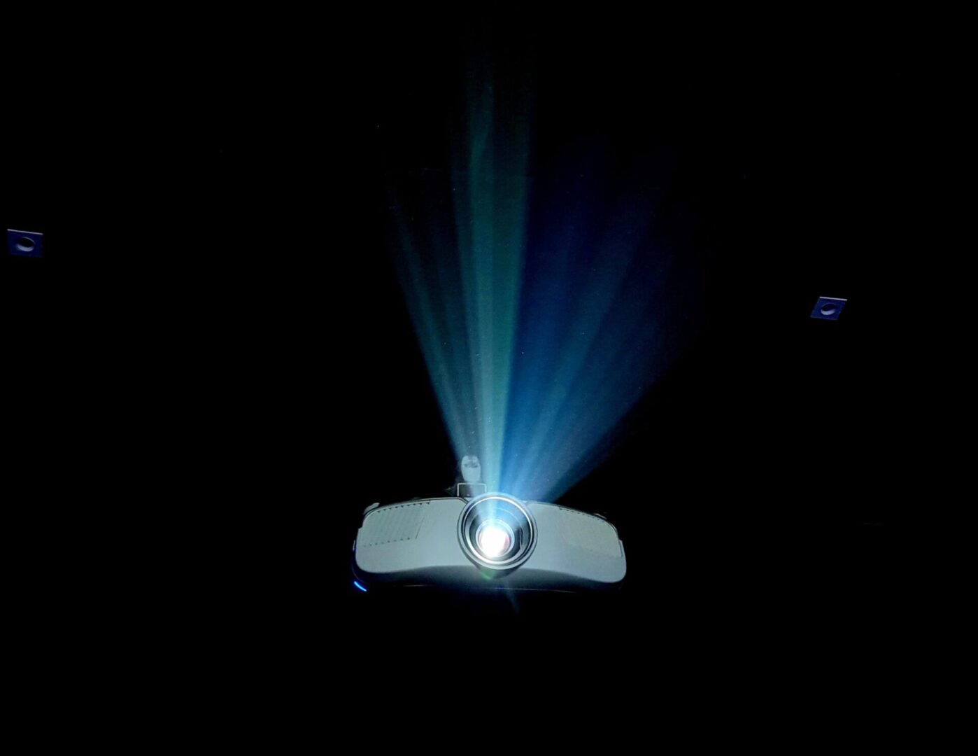 A projector with a light shining on it.