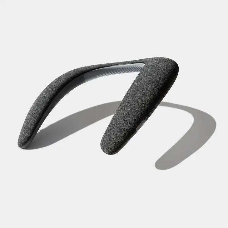 A gray headband with a black Konvex | Wireless Bluetooth Sound Collar ear piece.